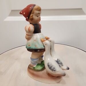 Vintage Cottagecore Child Hiding Food From Two Large Geese Porcelain Girl Figure